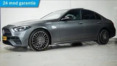 Grijs Gebruikt 2024 Mercedes C180 AMG Line Premium Sedan | € 50.950 (Eerlijke prijs)