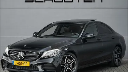 Zwart (metallic) Gebruikt 2021 Mercedes C180 AMG Sedan | € 32.900 (Super prijs)