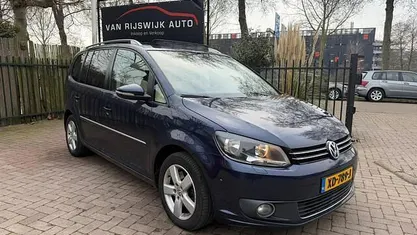 Blauw Occasion 2013 VW Touran Highline MPV | € 6.390 (Eerlijke prijs)