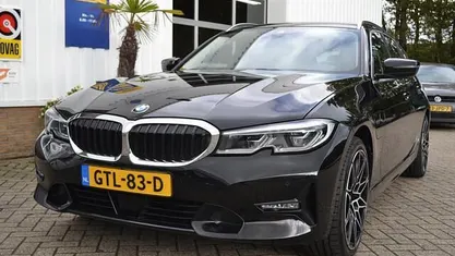Zwart Gebruikt 2021 BMW 330 Executive Stationwagen | € 29.950 (Goede deal)