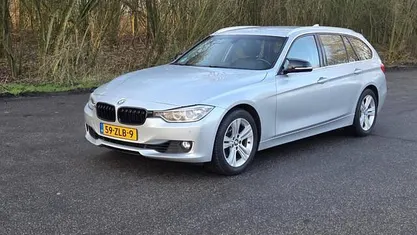 Grijs Occasion 2013 BMW 320 Executive Stationwagen | € 10.750 (Eerlijke prijs)