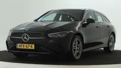 Donker kosmoszwart metaalkleur metallic Gebruikt 2024 Mercedes CLA250e Shooting Brake AMG Stationwagen | € 40.845 (Eerlijke prijs)