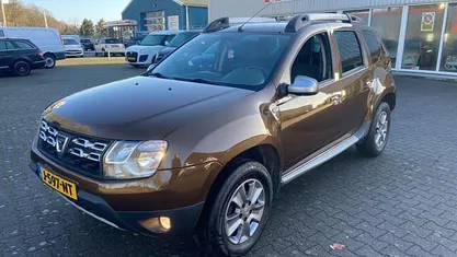 Bruin (metallic) Occasion 2015 Dacia Duster Prestige SUV | € 5.950 (Goede deal)