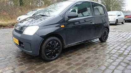 Occasion Daihatsu Cuore 59 PK (43 kW) 2004 Hatchback