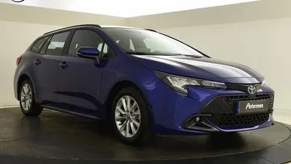 Blauw Gebruikt 2023 Toyota Corolla Hybrid Active Stationwagen | € 25.899 (Eerlijke prijs)