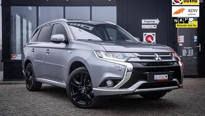 Grijs Gebruikt 2015 Mitsubishi Outlander P-HEV SUV | € 15.990 (Eerlijke prijs)