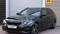 Zwart Gebruikt 2021 BMW 330e Executive Stationwagen | € 34.950 (Eerlijke prijs)