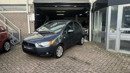 Grijs Gebruikt 2011 Mitsubishi Colt Edition Hatchback | € 2.999 (Super prijs)
