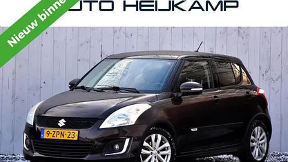 Bruin Gebruikt 2015 Suzuki Swift Exclusive Hatchback | € 9.950 (Eerlijke prijs)