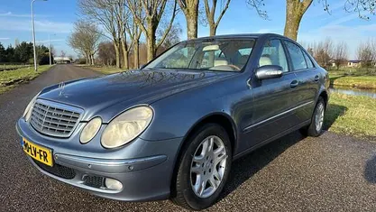Blauw (metallic) Occasion 2003 Mercedes E200 Avantgarde Sedan | € 3.999 (Super prijs)