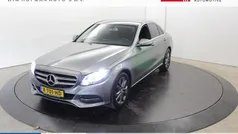 Grijs, metallic lak Gebruikt 2015 Mercedes C180 Prestige Sedan | € 16.890 (Goede deal)