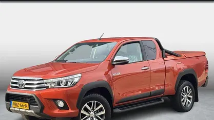 Oranje Gebruikt 2019 Toyota HiLux Pickup | € 29.950 (Goede deal)