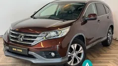 Rood, metallic lak Gebruikt 2014 Honda CR-V Executive SUV | € 17.988 (Eerlijke prijs)