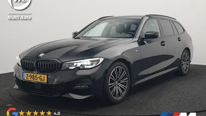 Zwart Occasion 2021 BMW 320 Executive Stationwagen | € 31.870 (Eerlijke prijs)