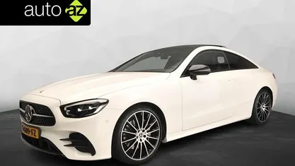 Wit Occasion 2021 Mercedes E200 AMG line Coupé | € 42.900 (Super prijs)