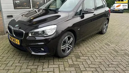 Bruin Gebruikt 2017 BMW 216 Executive Stationwagen | € 13.900 (Eerlijke prijs)