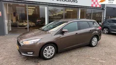 Bruin (metallic) Gebruikt 2018 Ford Focus Stationwagen | € 11.950 (Eerlijke prijs)