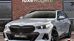 Grijs Gebruikt 2024 BMW 520 M Sport Stationwagen | € 64.900 (Goede deal)