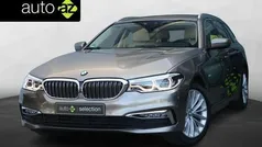 Grijs, metallic lak Gebruikt 2017 BMW 520 Executive Stationwagen | € 25.900 (Eerlijke prijs)