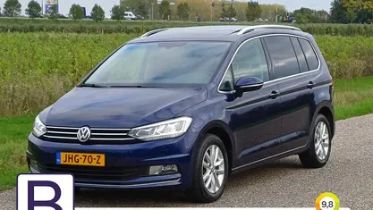 Blauw Gebruikt 2017 VW Touran Highline MPV | € 25.290 (Eerlijke prijs)