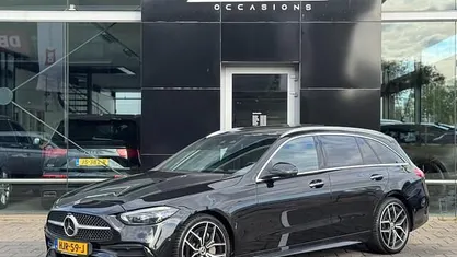 Zwart Gebruikt 2022 Mercedes C220 AMG line Stationwagen | € 34.995 (Eerlijke prijs)