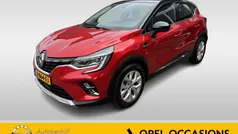 Rood, metallic lak Gebruikt 2022 Renault Captur Intens SUV | € 23.900 (Eerlijke prijs)