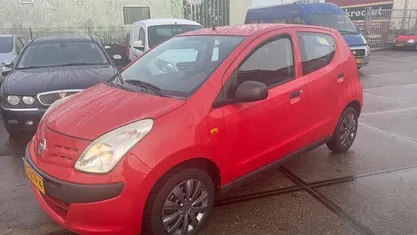 Occasion Nissan Pixo Visia 68 PK (50 kW) 2012 Rood Hatchback