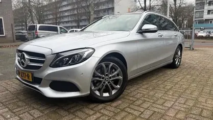 Grijs Occasion 2017 Mercedes C200 Premium Plus Stationwagen | € 18.750 (Super prijs)