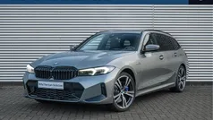 Grijs Gebruikt 2024 BMW 320e M Sport Stationwagen | € 40.850 (Eerlijke prijs)