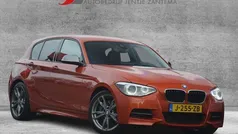 Oranje Gebruikt 2013 BMW M135 Executive Hatchback | € 22.445 (Eerlijke prijs)