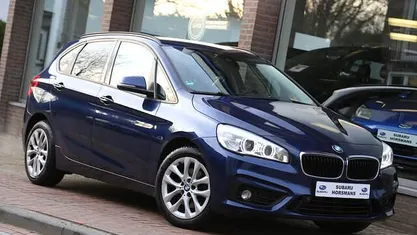 Blauw (metallic) Gebruikt 2015 BMW 220 Executive Stationwagen | € 13.750 (Eerlijke prijs)