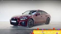 Rood, metallic lak Gebruikt 2024 BMW i4 Executive Sedan | € 48.900 (Goede deal)