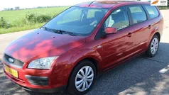 Oranje Gebruikt 2007 Ford Focus Trend Stationwagen | € 1.999 (Eerlijke prijs)