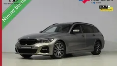 Grijs Gebruikt 2021 BMW 320 M Sport Stationwagen | € 33.845 (Eerlijke prijs)
