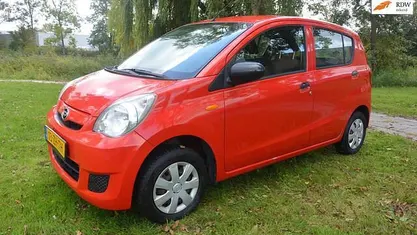 Occasion Daihatsu Cuore 69 PK (50 kW) 2008 Rood Hatchback