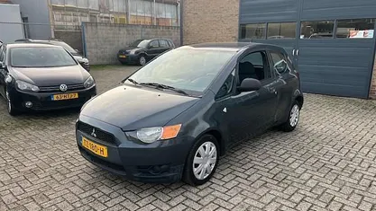 Grijs Occasion 2009 Mitsubishi Colt Inform Hatchback | € 1.390 (Eerlijke prijs)