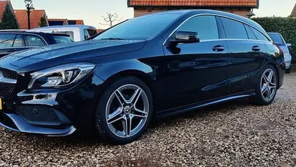 Occasion Mercedes CLA180 Shooting Brake AMG line 122 PK (89 kW) 2017 Zwart Stationwagen