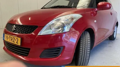 Occasion Suzuki Swift 94 PK (69 kW) 2012 Rood Hatchback