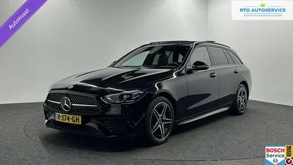 Zwart Occasion 2022 Mercedes C300e AMG line Stationwagen | € 36.500 (Eerlijke prijs)