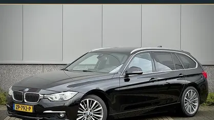 Zwart Occasion 2016 BMW 320 Executive Stationwagen | € 18.890 (Eerlijke prijs)