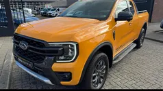 Oranje Gebruikt 2023 Ford Ranger Wildtrack Pickup | € 36.945 (Eerlijke prijs)
