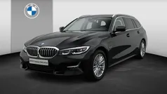 Zwart Gebruikt 2022 BMW 320e Executive Stationwagen | € 33.900 (Goede deal)