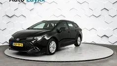 Zwart Gebruikt 2024 Toyota Corolla Hybrid Active Stationwagen | € 28.940 (Eerlijke prijs)