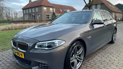 Bruin (metallic) Occasion 2017 BMW 520 M Sport Stationwagen | € 17.945 (Super prijs)