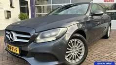 Grijs, metallic lak Gebruikt 2015 Mercedes C180 Prestige Stationwagen | € 11.998 (Goede deal)
