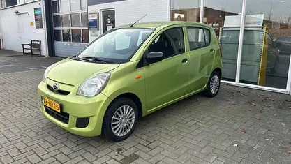Occasion Daihatsu Cuore 69 PK (50 kW) 2009 Groen Hatchback