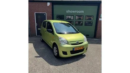 Occasion Daihatsu Cuore 69 PK (50 kW) 2009 Groen Hatchback