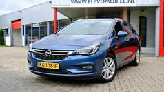 Blauw, metallic lak Gebruikt 2016 Opel Astra Business Stationwagen | € 10.450 (Eerlijke prijs)