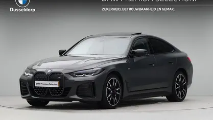 Grijs Gebruikt 2024 BMW i4 Executive Sedan | € 54.950 (Eerlijke prijs)