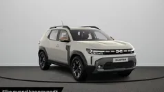 Sandstone (bruin metallic) Nieuw 2025 Dacia Duster Extreme SUV | € 35.425 (Eerlijke prijs)